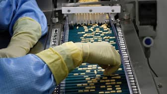 An employee inspects tablets as they move along the production line at a pharmaceutical plant of a major drug manufacturer in Goa. The US is the largest market for Indian drug makers. File photo/Reuters
