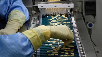 An employee inspects tablets as they move along the production line at a pharmaceutical plant of a major drug manufacturer in Goa. The US is the largest market for Indian drug makers. File photo/Reuters