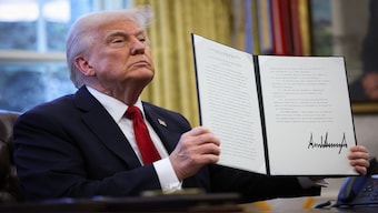 US President Donald Trump displays a signed executive order in the Oval Office about tariff increase. The US president has said that reciprocal tariffs will make trade fair for America. File image/AFP