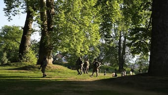 Indian soldiers guard inside a Mughal garden on the outskirts of Srinagar. Security has been heightened in the area following the Pahalgam attack, which claimed the lives of 26 people. AP