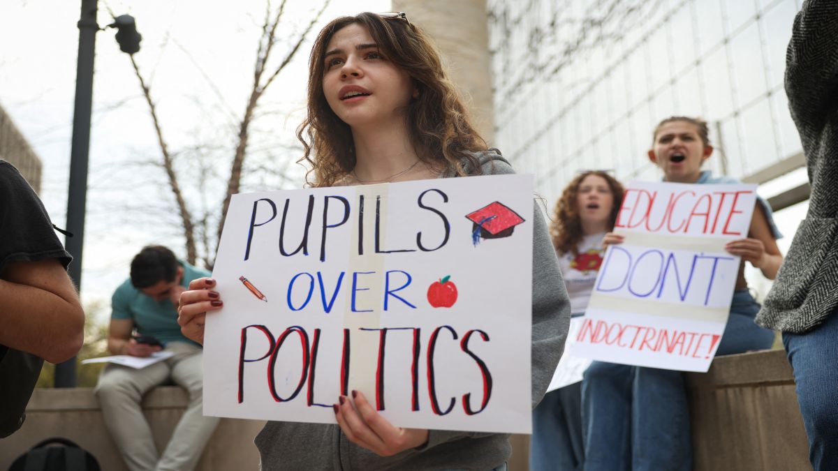 Students holds a sign during a rally in front of the US Department of Education in Washington, DC. Since Trump's return to power, he has waged war against many universities making it unsafe for foreign students. AFP Students holds a sign during a rally in front of the US Department of Education in Washington, DC. Since Trump's return to power, he has waged war against many universities making it unsafe for foreign students. AFP