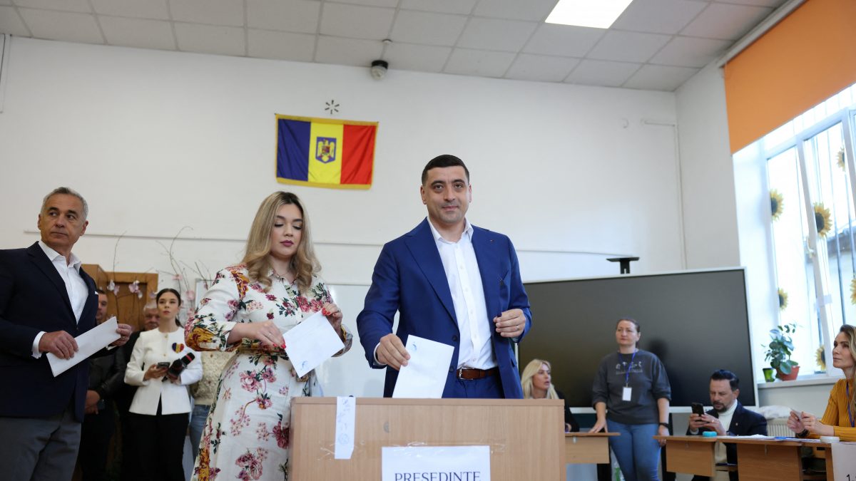 Presidential candidate George Simion votes during Romania's second round of the presidential election, in Mogosoaia, Romania. Reuters Presidential candidate George Simion votes during Romania's second round of the presidential election, in Mogosoaia, Romania. Reuters
