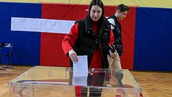 A woman votes during the first round of Poland's presidential election at a polling station in Warsaw, Poland. Reuters