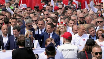Warsaw Mayor Rafal Trzaskowski, the presidential candidate of the Civic Coalition, attends "Patriotic March" organised by the ruling party, together with Polish Prime Minister Donald Tusk, ahead of the second round of presidential elections, in Warsaw, Poland. Reuters