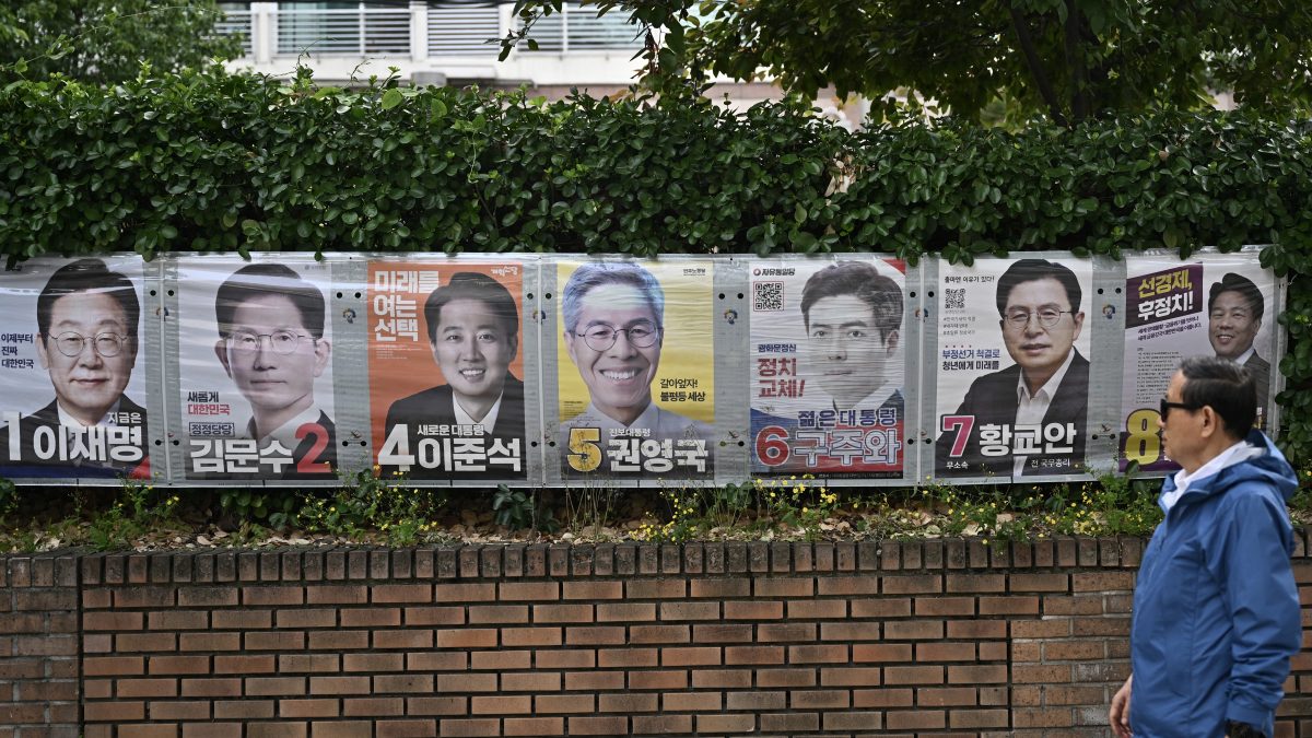 A man walks past banners showing South Korea's presidential candidates displayed along a wall ahead of the upcoming June 3 election in Seoul. AFP A man walks past banners showing South Korea's presidential candidates displayed along a wall ahead of the upcoming June 3 election in Seoul. AFP