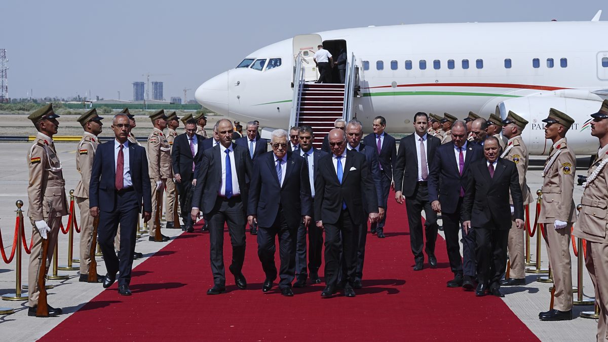Iraqi Foreign Minister Fuad Hussein, center right, welcomes Palestinian President Mahmoud Abbas upon arrival at Baghdad International Airport ahead of the 34th Arab League summit, in Baghdad, Iraq. AP Iraqi Foreign Minister Fuad Hussein, center right, welcomes Palestinian President Mahmoud Abbas upon arrival at Baghdad International Airport ahead of the 34th Arab League summit, in Baghdad, Iraq. AP
