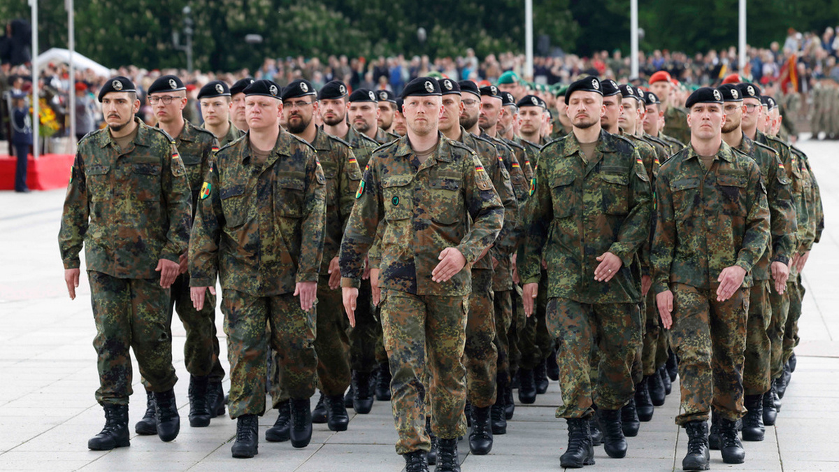German soldiers march at a formal inauguration of a German brigade for Nato's eastern flank in Vilnius. AP File German soldiers march at a formal inauguration of a German brigade for Nato's eastern flank in Vilnius. AP File