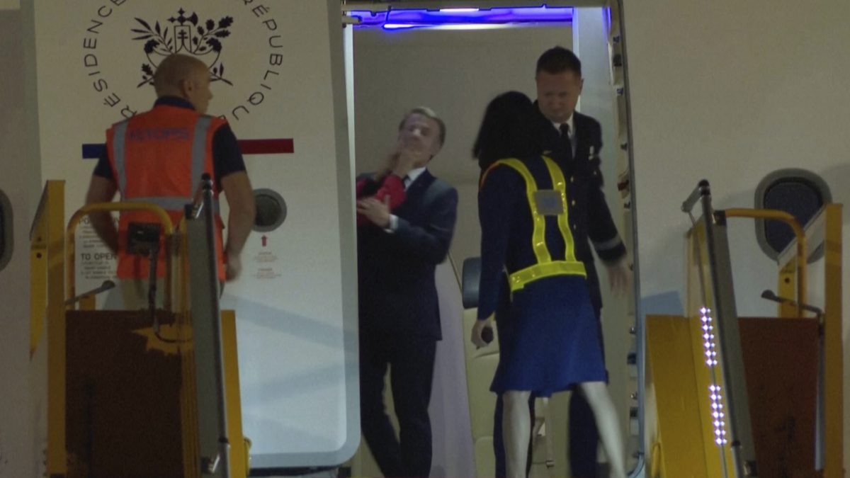 In this grab taken from video, France's President Emmanuel Macron prepares to disembark a plane on arrival, in Hanoi, Vietnam. AP In this grab taken from video, France's President Emmanuel Macron prepares to disembark a plane on arrival, in Hanoi, Vietnam. AP