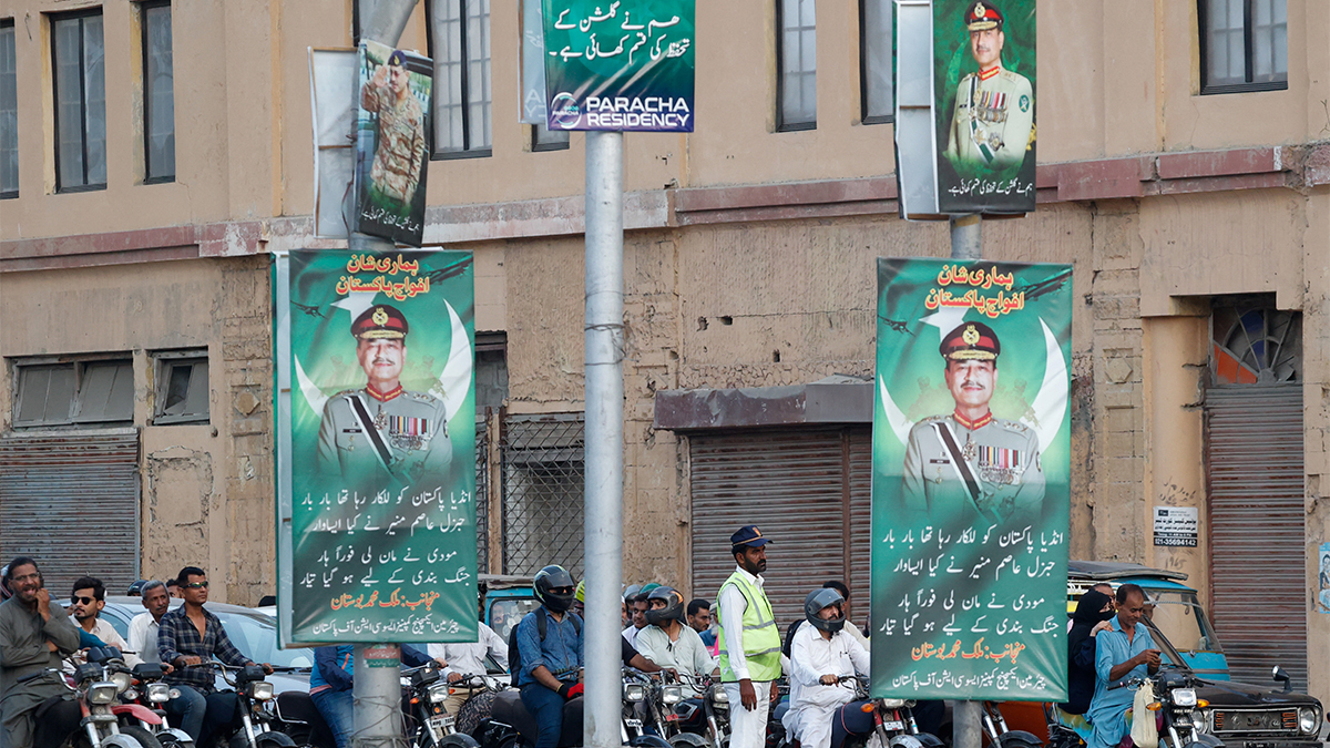 A police officer stands in front of the traffic, next to posters of Field Marshal Asim Munir, in Karachi, Pakistan on May 20, 2025. Reuters A police officer stands in front of the traffic, next to posters of Field Marshal Asim Munir, in Karachi, Pakistan on May 20, 2025. Reuters