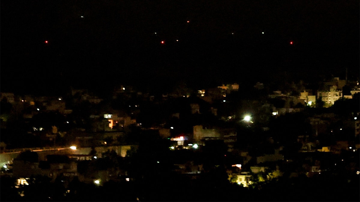 Fragile truce: Explosions, drone sightings see India issue late-night warning; Pakistan reins in troops