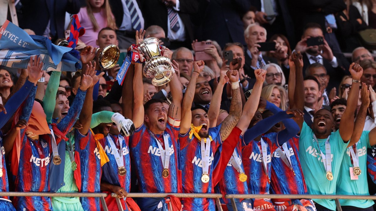 Crystal Palace players celebrate with the FA Cup trophy after defeating Manchester City in the final at London's Wembley Stadium. Reuters Crystal Palace players celebrate with the FA Cup trophy after defeating Manchester City in the final at London's Wembley Stadium. Reuters