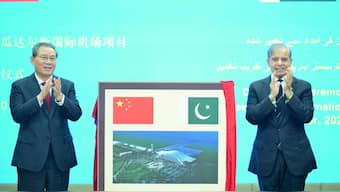 Chinese Premier Li Qiang and Pakistan's Prime Minister Shehbaz Sharif react after unveiling a plaque to mark the completion of the New Gwadar International Airport, during a ceremony at the Prime Minister's House in Islamabad, Pakistan October 14, 2024. (Photo: Reuters) 