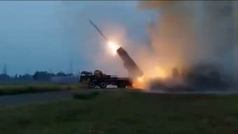 The photograph shows a Pakistani truck-mounted system launching missiles into India on May 10, 2025.