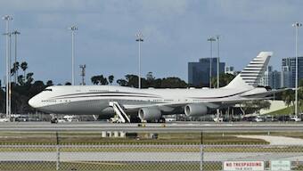 A Boeing 747 belonging to Qatar sits on the tarmac of Palm Beach International Airport after President Donald Trump toured the aircraft on Feb. 15. (Photo: AFP)
