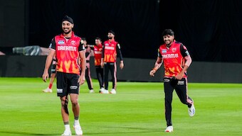Punjab Kings players practice at the HPCA Stadium, in Dharamsala, Wednesday. Image: PTI
