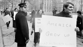 Demonstrators pass a security guard in New York City during gay rights protests. File image/AP