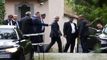 Members of the Iranian delegation leave the Omani embassy, where the fifth round of US-Iran talks takes place, in Rome, Italy, on Friday. Reuters
