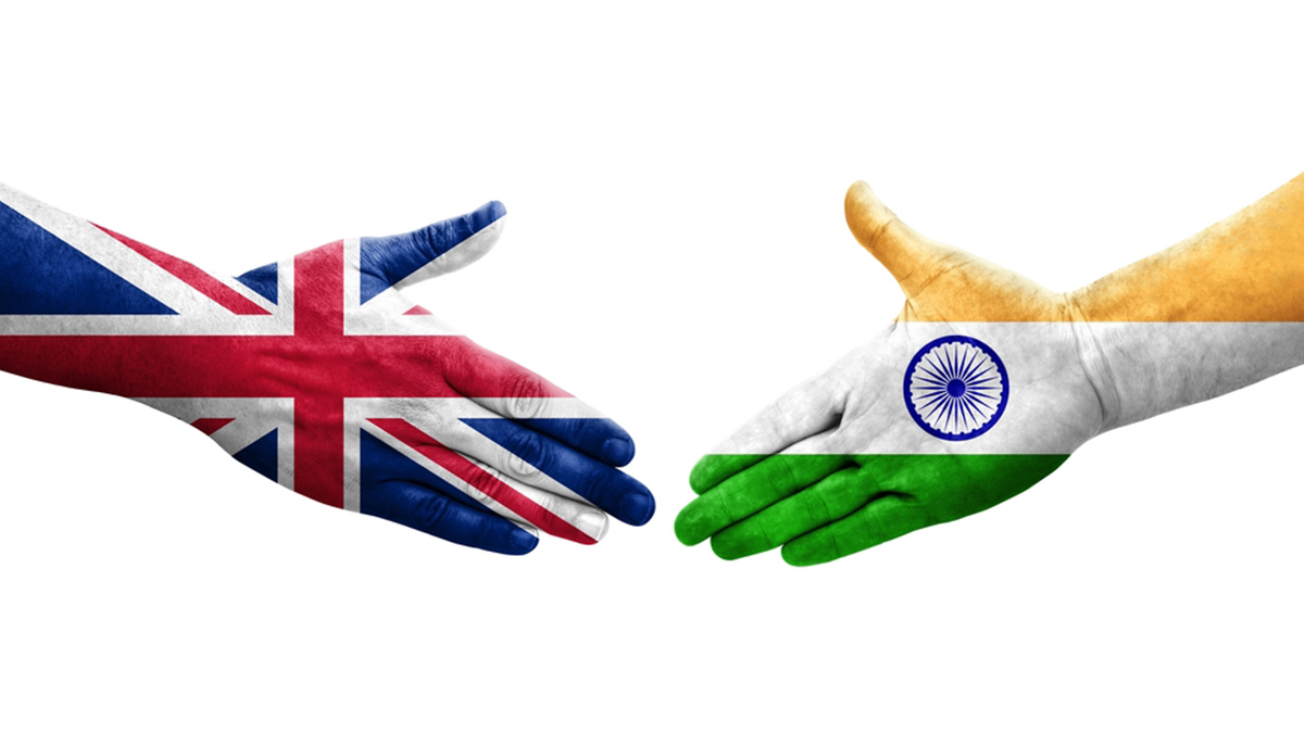 Handshake between India and United Kingdom flags painted on hands, Shutterstock Handshake between India and United Kingdom flags painted on hands, Shutterstock