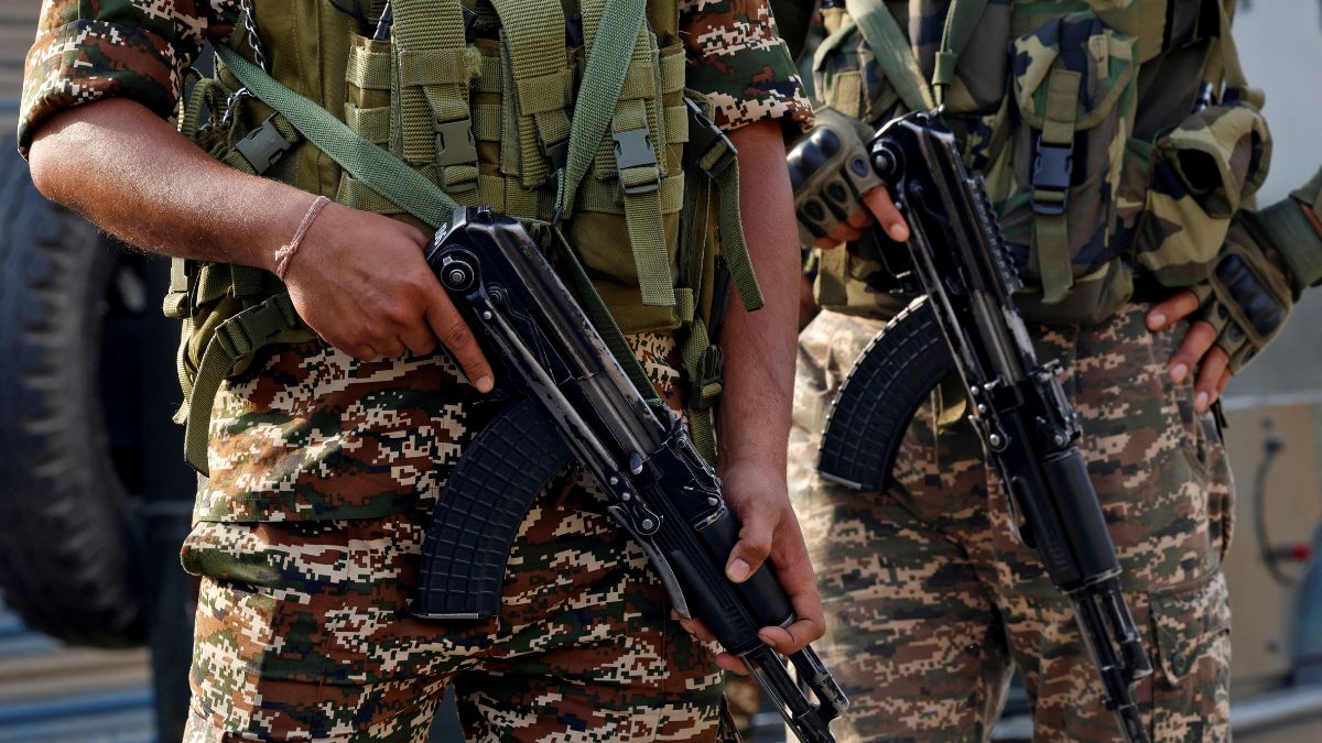 Indian security force personnel stand guard in Wuyan, Pulwama, in Kashmir, India, May 7, 2025. File Image/Reuters Indian security force personnel stand guard in Wuyan, Pulwama, in Kashmir, India, May 7, 2025. File Image/Reuters