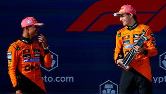 Oscar Piastri (right) and Lando Norris celebrate on the podium after delivering a one-two for McLaren at the Miami Grand Prix, continuing the team's dominance in the 2025 Formula 1 season. Reuters