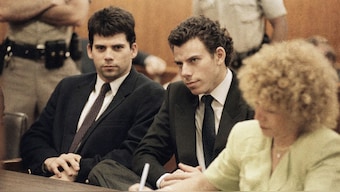 Lyle, left, and Erik Galen Menendez sit in a Beverly Hills, California courtroom, May 14, 1990 as a judge postponed their preliminary hearing on charges of murdering their parents last August. File Image/AP