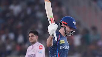 Lucknow Super Giants all-rounder Mitchell Marsh celebrates after completing his maiden IPL century against Gujarat Titans in Ahmedabad. AP