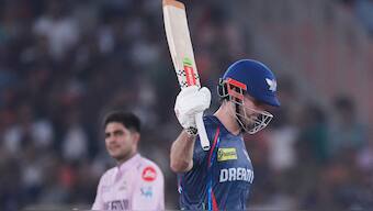 Lucknow Super Giants all-rounder Mitchell Marsh celebrates after completing his maiden IPL century against Gujarat Titans in Ahmedabad. AP