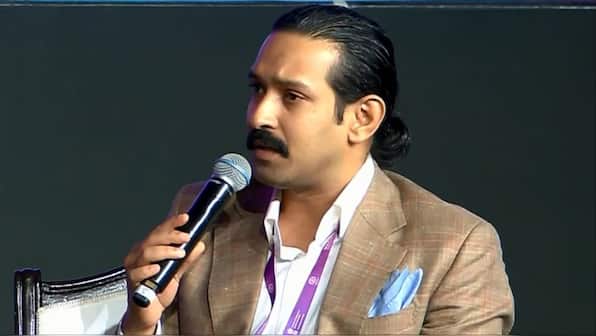 Firstpost at Waves 2025: Vikrant Massey's new look at summit goes viral, is it for his upcoming biopic on Sri Sri Ravi Shankar?
