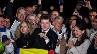 Presidential candidate Nicusor Dan reacts on the day of Romania's second round of the presidential election, in Bucharest, Romania, May 18, 2025. Reuters