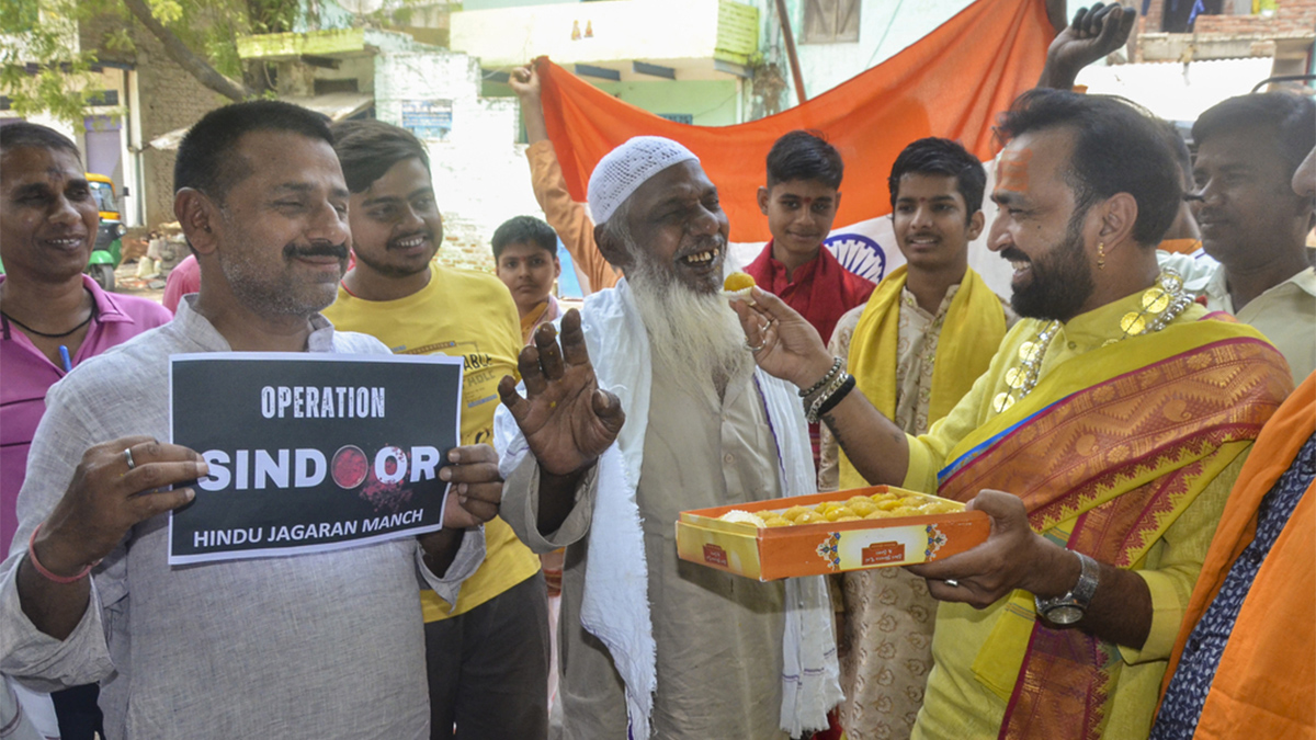 People celebrate the Indian armed forces' missile strikes on terror targets in Pakistan and Pakistan-occupied Kashmir (PoK) under 'Operation Sindoor', in retaliation to the Pahalgam terror attack, in Mirzapur, on May 8, 2025. PTI People celebrate the Indian armed forces' missile strikes on terror targets in Pakistan and Pakistan-occupied Kashmir (PoK) under 'Operation Sindoor', in retaliation to the Pahalgam terror attack, in Mirzapur, on May 8, 2025. PTI