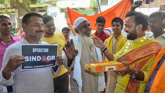 People celebrate the Indian armed forces' missile strikes on terror targets in Pakistan and Pakistan-occupied Kashmir (PoK) under 'Operation Sindoor', in retaliation to the Pahalgam terror attack, in Mirzapur, on May 8, 2025. PTI