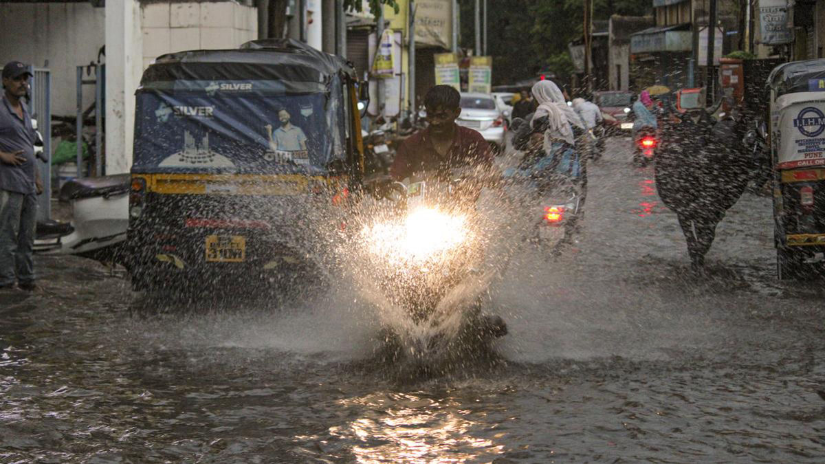 The monsoon arrived eight days early in Maharashtra, causing floods in Baramati and Indapur. Commuters amid rains, in Solapur, Maharashtra. (Photo: PI) The monsoon arrived eight days early in Maharashtra, causing floods in Baramati and Indapur. Commuters amid rains, in Solapur, Maharashtra. (Photo: PI)