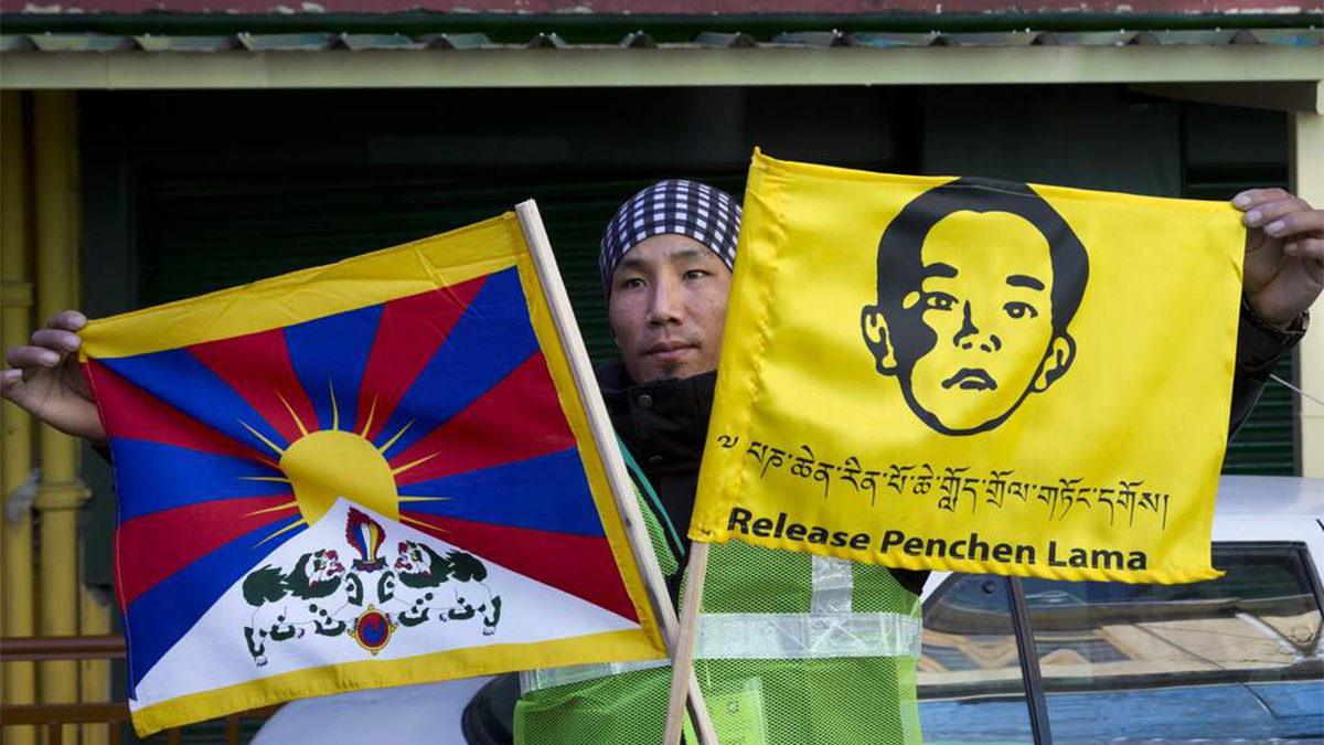 (File) A member of the Tibetan Youth Congress poses for a photograph before embarking on a motorcycle rally to create awareness about the Panchen Lama in Dharmsala on April 23, 2019. AP (File) A member of the Tibetan Youth Congress poses for a photograph before embarking on a motorcycle rally to create awareness about the Panchen Lama in Dharmsala on April 23, 2019. AP