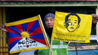 (File) A member of the Tibetan Youth Congress poses for a photograph before embarking on a motorcycle rally to create awareness about the Panchen Lama in Dharmsala on April 23, 2019. AP