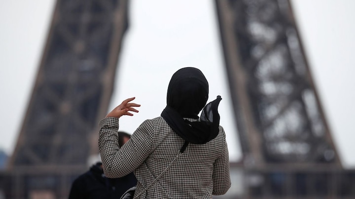Why is France planning to ban headscarves for girls under 15 in public?