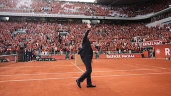Rafael Nadal waves to the crowd at Court Philippe-Chatrier during a special farewell ceremony organised by French Open on Sunday, 25 May. AP