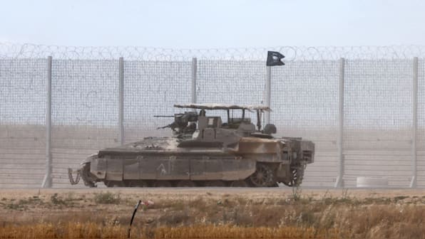 Israeli army begins calling up tens of thousands of reservists as Gaza war expands