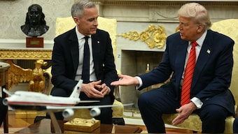 US President Donald Trump meets with Canadian Prime Minister Mark Carney in the Oval Office of the White House in Washington, DC, on May 6, 2025.  AFP Photo