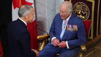 Canada Prime Minister Mark Carney, left, and King Charles talk ahead of the King delivering speech from the throne in the Senate in Ottawa, Canada on Tuesday, May 27, 2025.  Image- AP