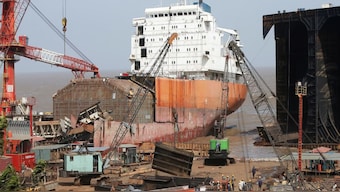 Workers sort out metal scrap of a decommissioned ship at the Alang shipyard in Gujarat, India, May 29, 2018. Image: REUTERS/Amit Dave
