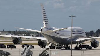 The motorcade of US President Donald Trump is parked next to a 12-year old Qatari-owned Boeing 747-8 that Trump was touring in West Palm Beach, Florida, February 15, 2025. File Image/Reuters