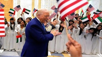 President Donald Trump and UAE President Mohammed bin Zayed Al Nahyan arrive at Qasr Al Watan, in Abu Dhabi, United Arab Emirates, on Thursday. AP
