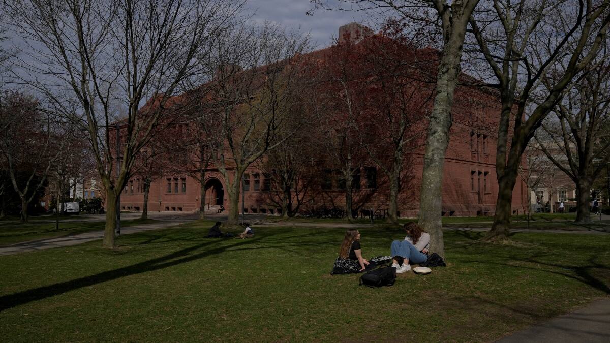 Trump threatens to revoke Harvard's tax-exempt status amid rising ...