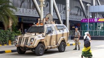 Security personnel keep watch at Sardar Vallabhbhai Patel International Airport in Ahmedabad. PTI

