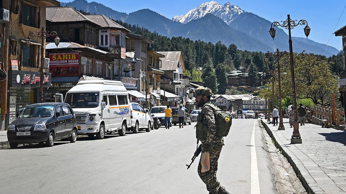 Indian paramilitary trooper patrols at a market area in Pahalgam south of Srinagar on April 29, 2025. AFP Indian paramilitary trooper patrols at a market area in Pahalgam south of Srinagar on April 29, 2025. AFP