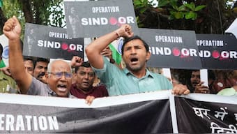 People shout slogans as they celebrate in Ahmedabad, Wednesday, May 7, 2025 after India fired missiles into Pakistan and PoK early Wednesday. AP