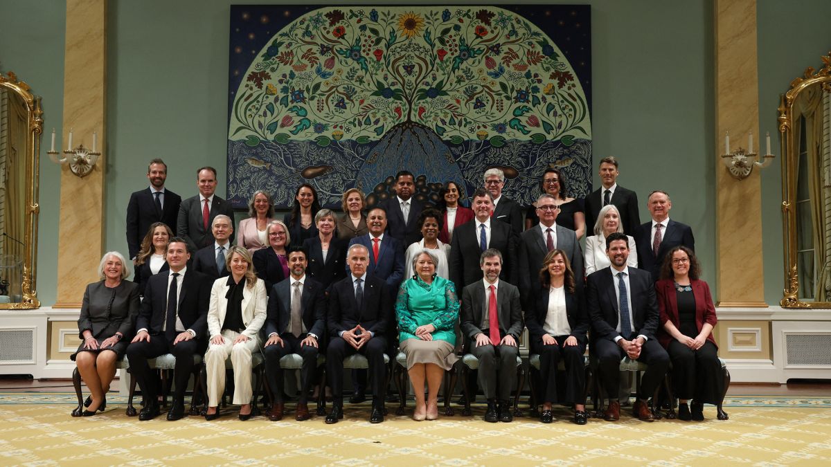 Canada's Prime Minister Mark Carney (center L), seated next to Governor General Mary Simon (ceneter R), poses for a group photo with the members of the Canadian cabinet following their swearing-in ceremony at Rideau Hall in Ottawa, Ontario, Canada, May 13, 2025. AFP Canada's Prime Minister Mark Carney (center L), seated next to Governor General Mary Simon (ceneter R), poses for a group photo with the members of the Canadian cabinet following their swearing-in ceremony at Rideau Hall in Ottawa, Ontario, Canada, May 13, 2025. AFP
