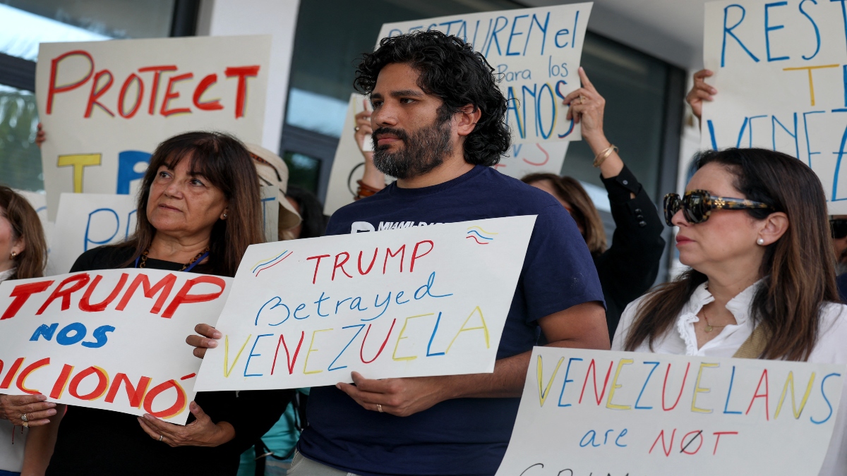 People stand together to support a resolution in favour of reinstating temporary protected status for Venezuelans on February 13, 2025 in Miami, Florida. AFP File People stand together to support a resolution in favour of reinstating temporary protected status for Venezuelans on February 13, 2025 in Miami, Florida. AFP File