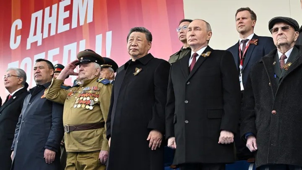 Russian President Vladimir Putin, center right, and Chinese President Xi Jinping, center, watch the Victory Day military parade in Moscow, Russia, on Friday, May 9. Image: Mikhail Korytov/Photo host agency RIA Novosti via AP Russian President Vladimir Putin, center right, and Chinese President Xi Jinping, center, watch the Victory Day military parade in Moscow, Russia, on Friday, May 9. Image: Mikhail Korytov/Photo host agency RIA Novosti via AP