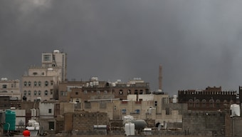 Smoke billows after an Israeli airstrike on Houthi infrastructure, in Sana'a, Yemen, on Tuesday. Reuters 